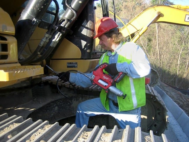 Milwaukee Grease Gun in use