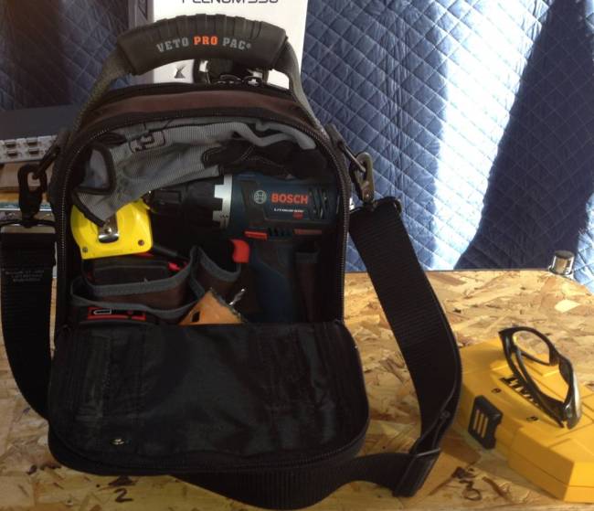 The other side of the Veto Pro Pac MC stuffed with a variety of tools.