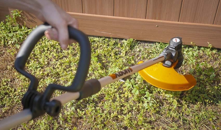 Worx 56V string trimmer cutting