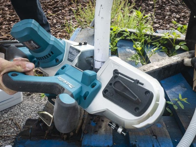 Makita band saw cutting PVC pipe