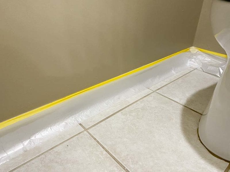 PlazMask along baseboard