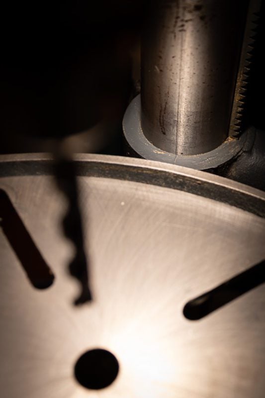 Line on a drill press column