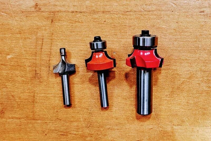 Poor quality HHS (High Speed Steel) friction bearing bit on the left, medium quality carbide Taiwanese made bit in the center and a high quality Italian made Freud bit on the right. All three are 3/8-inch round over bits and will produce the same cut pattern, but the more you pay for the bit, the longer it will last and the cleaner the cut it will give you.